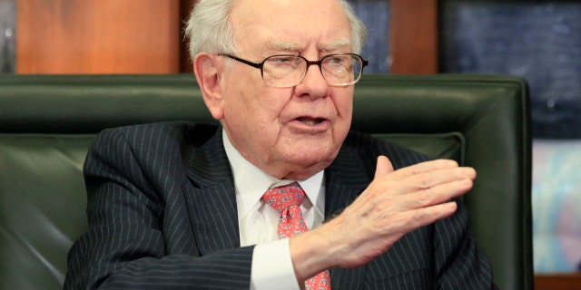 In a Monday, May 8, 2017 file photo, Berkshire Hathaway Chairman and CEO Warren Buffett gestures during an interview by Liz Claman of the Fox Business Network in Omaha, Neb.