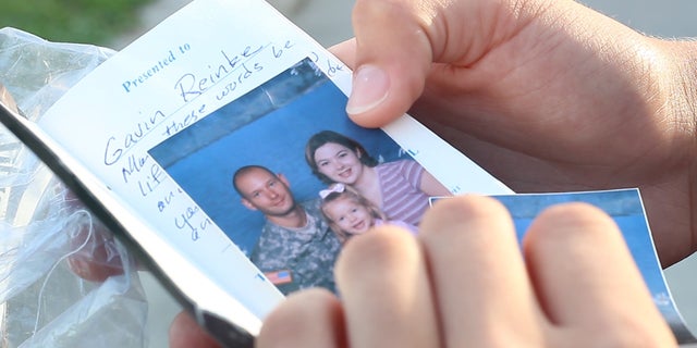 “I have a bible he had while he was over there.... that had pictures of me and my mom in it... I keep that in my golf bag," Buggy said.
