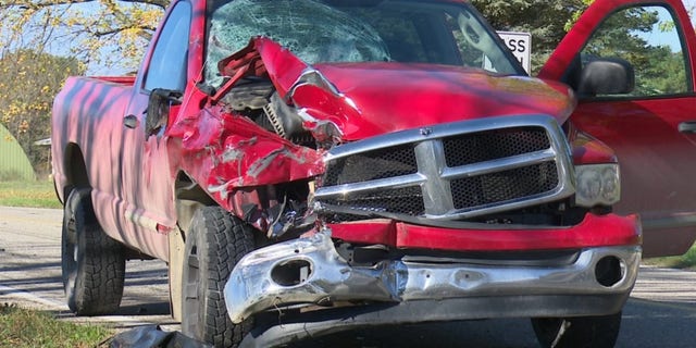 The driver of the pickup truck was not injured after his truck "demolished" the buggy.