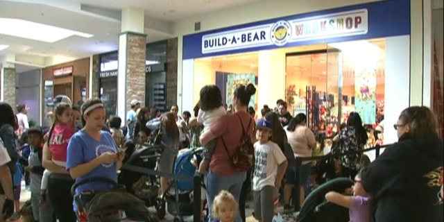 Parents on Thursday waited in line with their children for hours to get their hands on a discounted stuffed toy. (KGO via NNS)