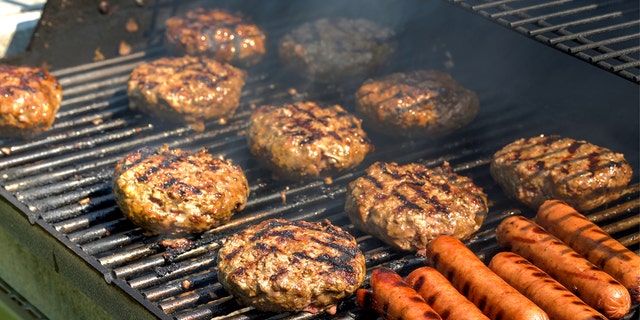 grilling burgers istock