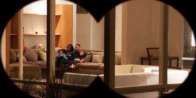 looking into house at night