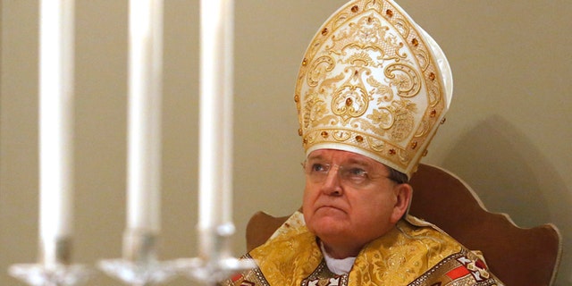 Cardinal Raymond Leo Burke leads a Holy Mass in the chapel of the Vatican Governorate to mark the opening of the Judicial Year of the Tribunal of Vatican City at the Vatican, January 11, 2014. REUTERS/Stefano Rellandini (VATICAN - Tags: RELIGION) - RTX179EI