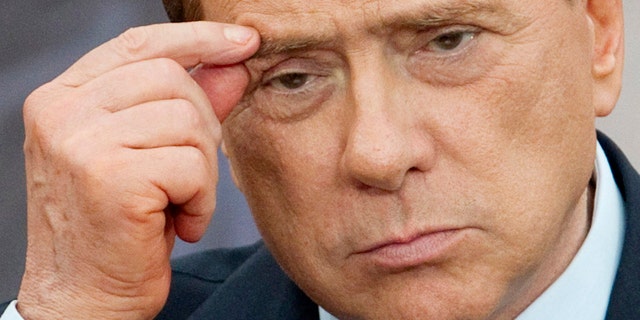 June 13: Italian Premier Silvio Berlusconi gestures during a joint press conference with Israel's Prime Minister Benjamin Netanyahu, in Rome.