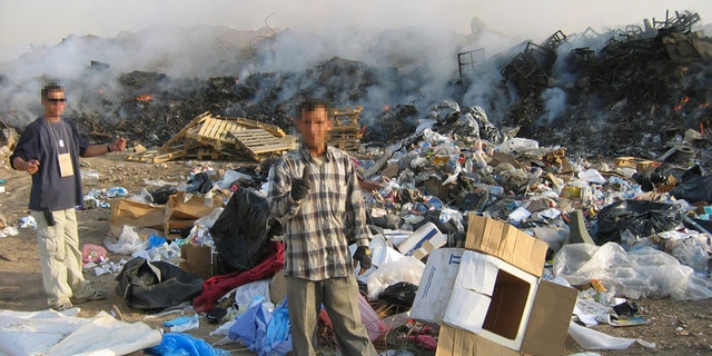 Nelson eventually rounded up volunteers to go and pull hazardous materials out of the trash piles by hand before they were added to the smoldering burn pits.