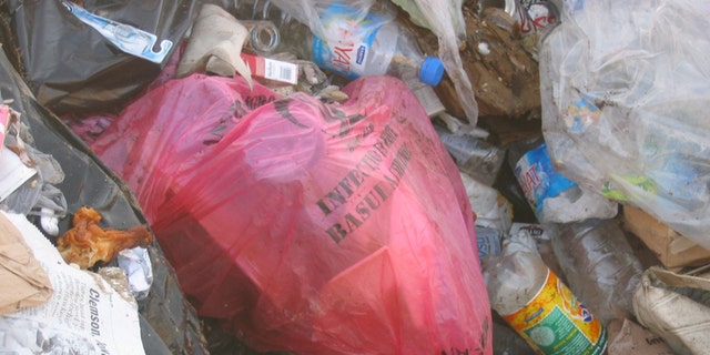 Nelson says that they also found large amounts of medical waste, like IV drips, needles, bloody gauze and even appendages.