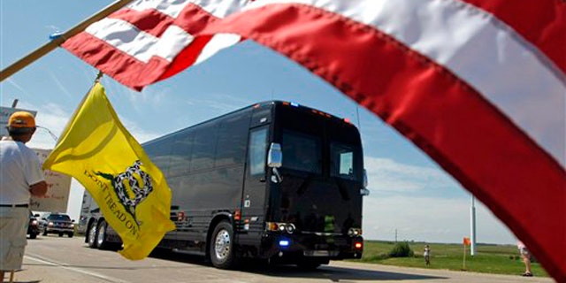 Aug. 16: President Obama's motorcade makes its way through Peosta, Iowa, en route to the Rural Economic Forum at the Northeast Iowa Community College.