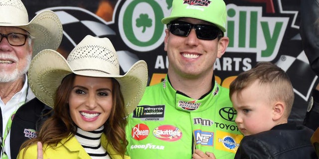Samantha, Kyle and son Brexton Locke celebrate Busch's April win in Texas.