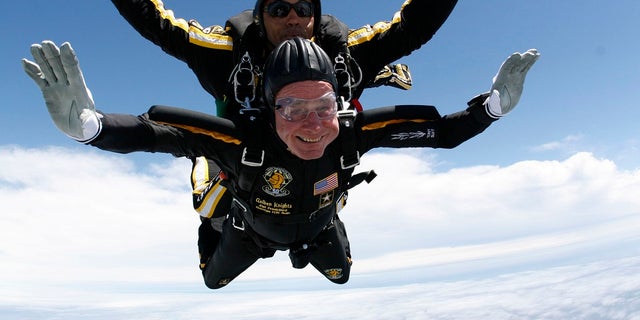 Former President George H.W. Bush jumps out of an airplane for his 85th birthday in 2009.