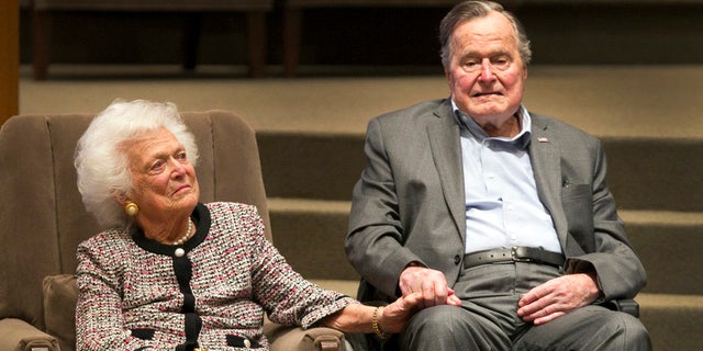 In this March 8, 2017, file photo, former President George H.W. Bush and former first lady Barbara Bush attend an awards ceremony hosted by Congregation Beth Israel after the Mensch International Foundation presented its annual Mensch Award to the former president in Houston. 