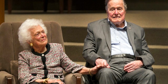 In this March 8, 2017, file photo, former President George H.W. Bush and former first lady Barbara Bush attend an awards ceremony hosted by Congregation Beth Israel after the Mensch International Foundation presented its annual Mensch Award to the former president in Houston.