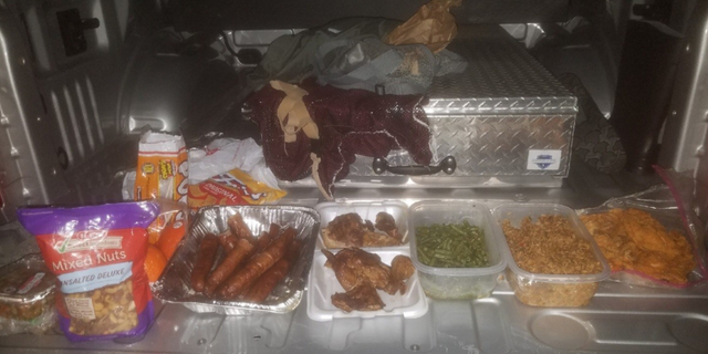 Authorities found alcohol, BBQ sausages, pre-packaged snacks, and dozens of packages of tobacco inside the duffel bag of a prisoner who was trying to reenter the complex.