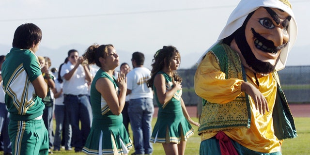 FILE 2005: Coachella Valley High School's mascot dances to the band during a pep rally at the school in Thermal, Calif.
