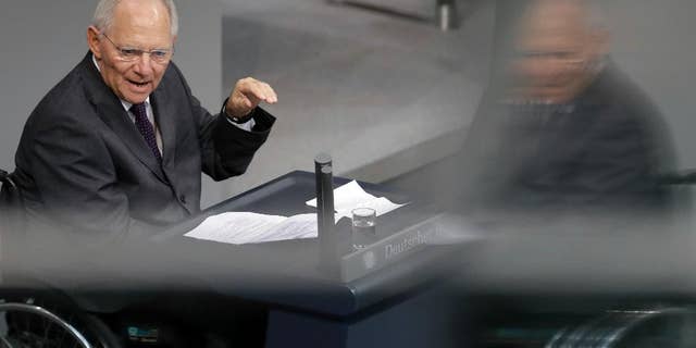 German Finance Minister Wolfgang Schaeuble speaks during a budget debate as part of a meeting of the German Federal Parliament, Bundestag, at the Reichstag building in Berlin, Germany, Tuesday, Nov. 22, 2016. (AP Photo/Michael Sohn)