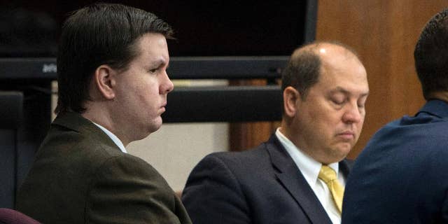 FILE - In this Oct. 3, 2016 file photo, Justin Ross Harris, left, listens to jury selection during his murder trial at the Glynn County Courthouse in Brunswick, Ga. Harris, 34, is charged with murder in the death of his 22-month-old son, Cooper. He's also charged with sending graphic, sexual text messages and photos to a girl for a period of several months when she was 16 and 17. (Stephen B. Morton/Atlanta Journal-Constitution via AP, Pool)