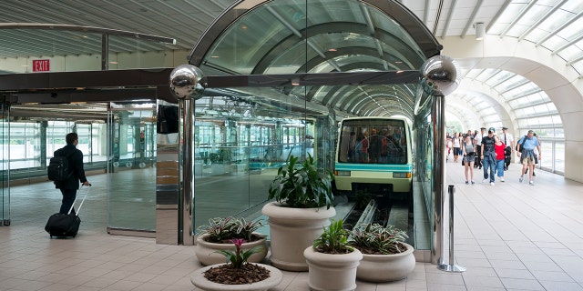 Travelers can opt out of the facial recognition procedure, a spokeswoman for Customs and Border Protection has said, but a critic argues that this particular information is not immediately clear.