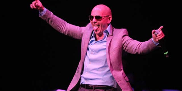 Sept. 11, 2010: Rapper Pitbull performs onstage during Motorola at Pérez Hilton's 'One Night in Los Angeles' at the Wiltern Theatre in Los Angeles, Calif.