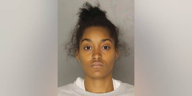 FILE - This Wednesday, Nov. 2, 2016, file booking photo provided by the Allegheny County Police Department shows Christian Clark, of McKeesport, Pa. Police said Clark, charged with criminal homicide in the death of her son Andre Price III, sent a video of the boy's apparently lifeless body to his father in a jealous, vengeful rage during a text-messaged argument. Clark is due in court Wednesday, Nov. 16. (Allegheny County Police Department via AP, File)