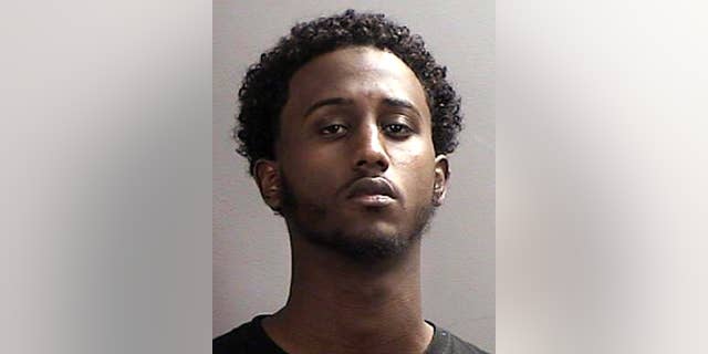 FILE - This file photo provided April 21, 2015 by the Sherburne County, Minnesota, Sheriff’s Office shows Hanad Mustafe Musse, 19. Musse is among seven Minnesota men of Somali descent that have been charged in a indictment with traveling or attempting to travel to Syria to join the Islamic State group, which has carried out a host of attacks including beheading Americans. (Sherburne County Sheriff’s Office via AP, File)