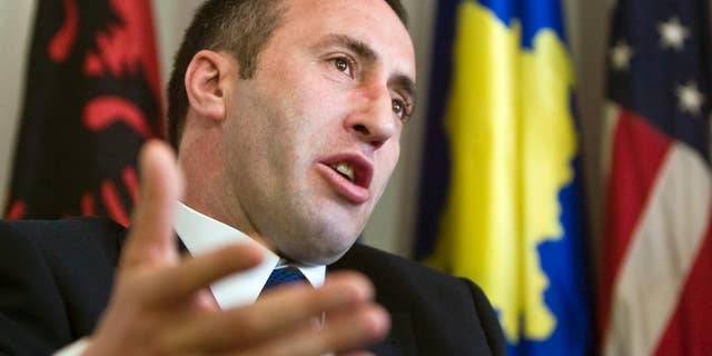 FILE - In this file photo dated Tuesday, April 22, 2008, Kosovo's former prime minister Ramush Haradinaj gestures during an interview with The Associated Press in Kosovo's capital Pristina. Kosovo's foreign ministry said in a statement Wednesday Jan. 4, 2017, that French police have detained Haradinaj based on an arrest warrant issued by Serbia. (AP Photo/Visar Kryeziu, FILE)