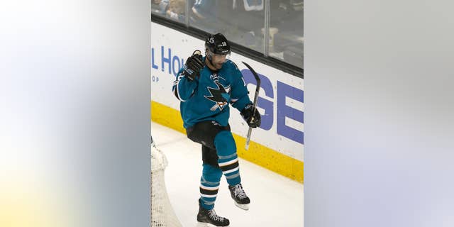 San Jose Sharks center Patrick Marleau (12) celebrates after scoring a goal against the Edmonton Oilers during the third period in Game 6 of a first-round NHL hockey playoff series Saturday, April 22, 2017, in San Jose, Calif. The Oilers won 3-1. (AP Photo/Tony Avelar)