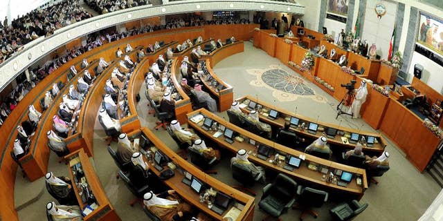 FILE - This Dec. 16, 2012 file photo shows a General view of Kuwait's National Assembly during the inauguration of the 14th Legislative Term of the National Assembly in Kuwait. Kuwait's Cabinet has resigned and its parliament was dissolved Sunday, Oct. 16, 2016, over a "lack of cooperation," setting the stage for early elections. Kuwait's state-run television and news agency made the announcement after an emergency government meeting. In a decree, Kuwait's ruling emir Sheikh Sabah Al Ahmad Al Sabah said "given the circumstances in the region ... and the security challenges" he had ordered the parliament dissolved. (AP Photo/Gustavo Ferrari, File)