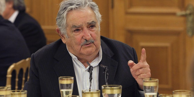 MADRID, SPAIN - MAY 29: President of Uruguay Jose Mujica attends a dinner hosted by King Juan Carlos I of Spain (not pictured) at Zarzuela Palace on May 29, 2013 in Madrid, Spain. Uruguay's President Jose Mujica is visiting Spain as part of an official tour to China, Spain, Italy and Vatican. (Photo by Alberto Martin - Pool/Getty Images)