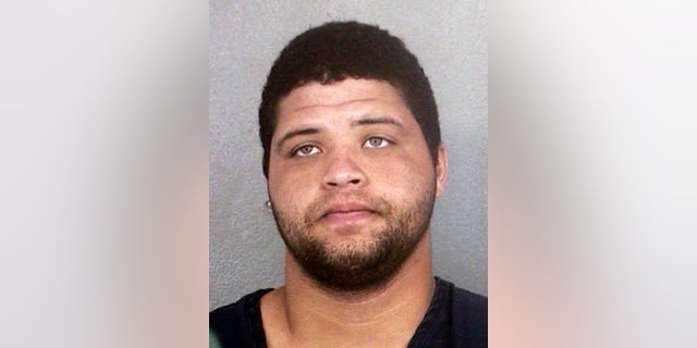 Authorities were still trying to determine why Omar Enrique Perez opened fire inside the lobby of a building where he never worked.
