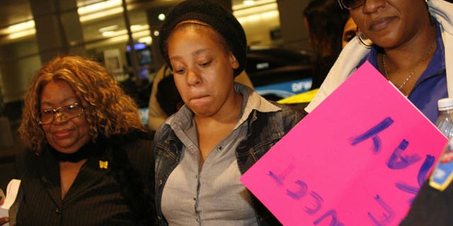 January 6: Jakadrien Turne walks with her grandmother Lorene Turnerand mother Johnisa Turnerat DFW Airport in Fort Worth, Texas.