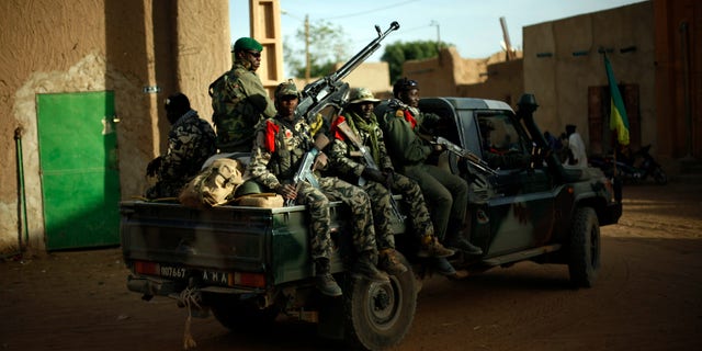 Malian soldiers patrol the streets of Gao, northern Mali, Tuesday Feb. 5, 2013. Troops from France and Chad moved into Kidal in an effort to secure the strategic north Malian city, a French official said Tuesday, as the international force put further pressure on the Islamic extremists to push them out of their last major bastion of control in the north.(AP Photo/Jerome Delay)