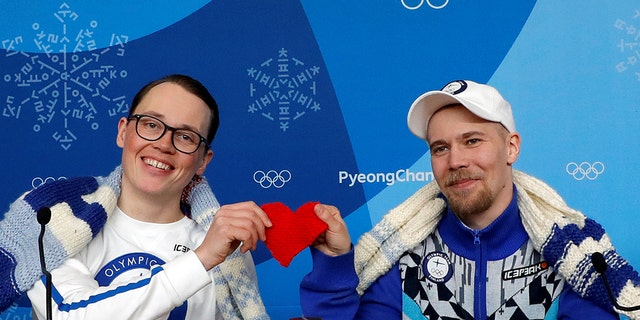 Antti Koskinen, snowboard head coach, and snowboarder Roope Tonteri attend a news conference regarding the knitting project in Pyeongchang, South Korea, February 14, 2018.