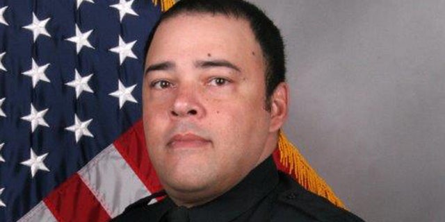 Eric Mumaw, the Nashville police officer who died while rescuing a woman near the Cumberland River.