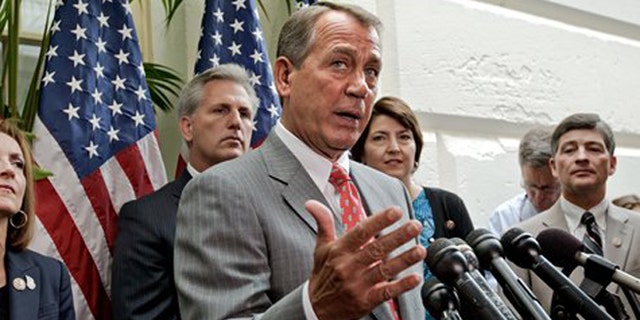 FILE - In this July 10, 2012, file photo, House Speaker John Boehner, R-Ohio, speak to the media at the Capitol in Washington, as Rep. Nan Hayworth, R-NY., House Majority Whip Kevin McCarthy, R-Calif., House Speaker John Boehner, Rep. Cathy McMorris Rodgers, R-Wash., and Rep. Jeb Hensarling, R-Texas, listen. Senate-passed bills to cut farm subsidies and food stamps and overhaul the financially distraught Postal Service have been put on hold by House Republican leaders wary of igniting internal party fights or risking voters' ire three months before the election. (AP Photo/J. Scott Applewhite)