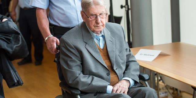 June 11, 2016: A former SS guard at the Auschwitz death camp, Reinhold Hanning, 94, arrives at a courtroom in Detmold, Germany.