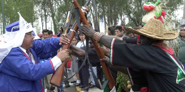 388842 04: Mexicans celebrate Cinco de Mayo with a reenactment of the 1862 battle between the French and the Zacapuaxtlas Indians May 5, 2001 in Puebla, Mexico. Mexicans celebrate their victory over France with reenactements and parades around the country. (Photo by Susana Gonzalez/Newsmakers)