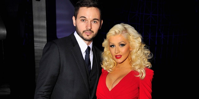 MOUNTAIN VIEW, CA - NOVEMBER 09: Singer Christina Aguilera (R) and Matt Rutler attend the Breakthrough Prize Awards Ceremony Hosted By Seth MacFarlane at NASA Ames Research Center on November 9, 2014 in Mountain View, California. (Photo by Steve Jennings/Getty Images for Breakthrough Prize)