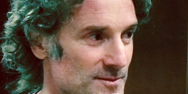 This image provided by the Curtis family shows Peter Theo Curtis in Newark, N.J. on Tuesday, Aug. 26, 2014. Curtis, a freelance reporter who wrote under the byline Theo Padno and who had been held hostage for about two years in Syria, returned to the U.S. on Tuesday. (AP Photo/Curtis Family)
