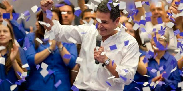 National Party's Juan Orlando Hernandez after partial election results in Tegucigalpa, Honduras, Sunday, Nov. 24, 2013.