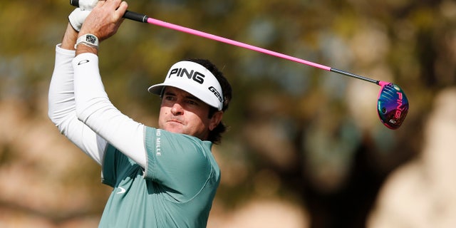 Bubba Watson hits a tee shot at the second hole during the third round of the Phoenix Open golf tournament, Saturday, Feb. 1, 2014, in Scottsdale, Ariz. (AP Photo/Ross D. Franklin)