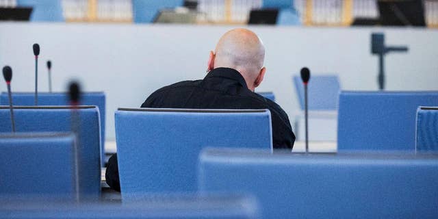 FILE - In this June 22, 2016 file picture accused Frank S. sits in a courtroom of the higher regional court in Duesseldorf, Germany.  A German federal court has rejected an appeal Monday Jan. 9, 2017 by a far-right extremist sentenced to 14 years in prison for the attempted murder of a politician who is now Cologne’s mayor. The defendant, identified only as Frank S. in line with German privacy rules, was convicted by a Duesseldorf court in July. Henriette Reker, who was in charge  of housing refugees in Cologne at the time, was stabbed in the neck Oct. 17, 2015 as she campaigned.  (Rolf Vennenbernd/dpa via AP, file)