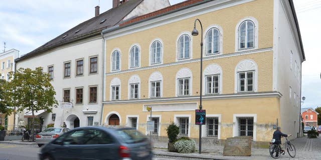 FILE - This Sept. 27, 2012 file picture shows an exterior view of Adolf Hitler's birth house in Braunau am Inn, Austria. An Austrian newspaper reports that the owner of the house where Adolf Hitler was born is going to high court to challenge the government’s right to take possession of the property. The daily Kurier, in a report for its Tuesday, Jan. 31, 2017 edition, says owner Gerlinde Pommer has asked Austria’s Constitutional Court to rule against the government move. (AP Photo / Kerstin Joensson, File)