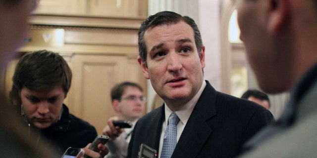 FILE - In this Dec. 13, 2014 file photo, Sen. Ted Cruz, R-Texas talks with reporters on Capitol Hill in Washington. Unhappy Republicans say Sen. Ted Cruz of Texas left a gift certificate good for confirmation of 12 judicial appointments for President Barack Obama and Democrats this holiday season. Only a month or so ago, voters delivered them a lump of coal in mid-term elections. (AP Photo/Lauren Victoria Burke, File)