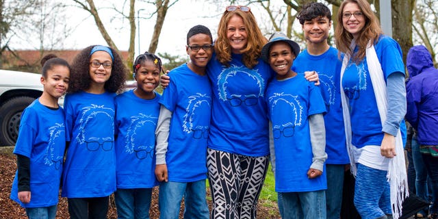 The Hart family of Woodland, Wash., is seen at a Bernie Sanders rally in Vancouver, Wash., March 20, 2016.