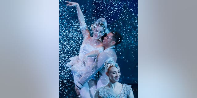 In this photo, soloist Abigail Morwood is shown performing during the Cincinnati Ballet's dress rehearsal of ‘The Nutcracker’ at the Aronoff Center on Dec. 17, 2015, in Cincinnati, Ohio. Fox News' Emily Compagno in ‘All American Christmas’ shares her own joy of performing and giving back to others. (AP Photo/John Minchillo)