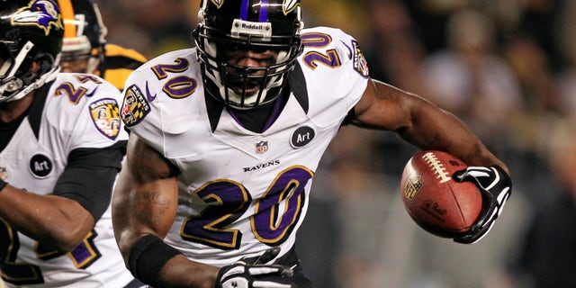 FILE - In this Nov. 18, 2012, file photo, Baltimore Ravens free safety Ed Reed runs after recovering a fumble by Pittsburgh Steelers wide receiver Mike Wallace during the first quarter of an NFL football game in Pittsburgh. Matt Birk dragged his bulky knees and aching body back to play another season for one reason: to get to the Super Bowl. At long last, Birk, Reed and several other veterans on the Ravens get the chance to play in football's biggest game. (AP Photo/Gene J. Puskar, File)