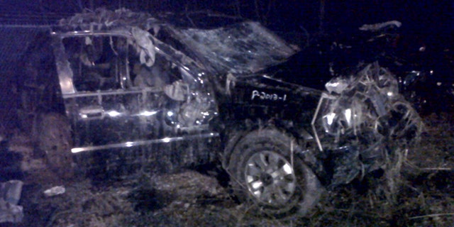 March 10, 2013: This photo shows a Honda Passport that crashed into a guardrail and flipped over into a swampy pond Sunday morning in Warren, Ohio. Highway Patrol officials say speed was a factor in the violent early morning crash of the vehicle that killed six teenagers in northeast Ohio.