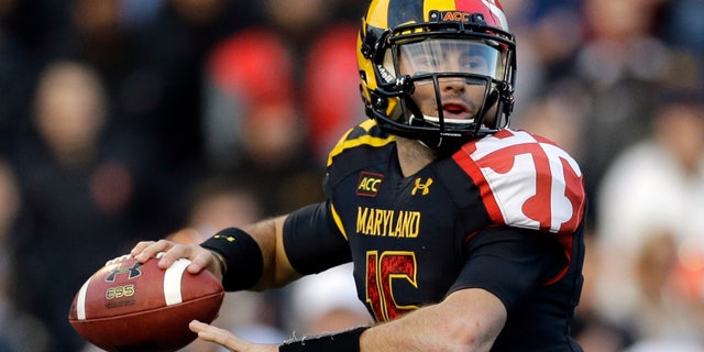 Maryland quarterback C.J. Brown looks to throw during the first half of an NCAA college football game against Syracuse in College Park, Md., Saturday, Nov. 9, 2013. (AP Photo/Patrick Semansky)