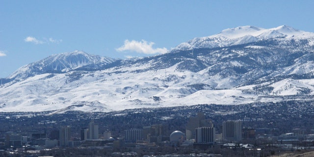 Sunshine prevailed across the snow-covered Sierra foothills and ridge tops halfway between Reno and Lake Tahoe to the southwest in this photo taken in Reno, Nevada on Tuesday, Feb. 28, 2017. The Mount Rose ski resort, top left, already has received a record 54 feet of snow this season. Lake Tahoe has reached its highest level since 2006.(AP Photo/By Scott Sonner).