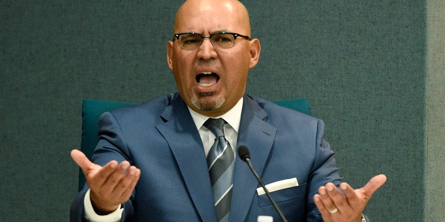 Pico Rivera, Calif., City Councilman and El Rancho High School teacher Gregory Salcido addresses the public during a city council meeting at Pico Rivera City Hall on Tuesday.