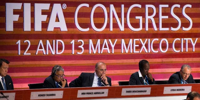 FIFA council members listen during the 66th FIFA Congress, in Mexico City, Friday, May 13, 2016. From left, are Kohzo Tashima of Japan, Prince Abdullah of Malaysia, Tarek Bouchamaoui of Tunisia, Lydia Nsekera of Burundi, and Hany Abo Rida of Egypt. (AP Photo/Rebecca Blackwell)
